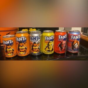 Assorted Flavors Soda Cans - Orange, Silver, Yellow, Red